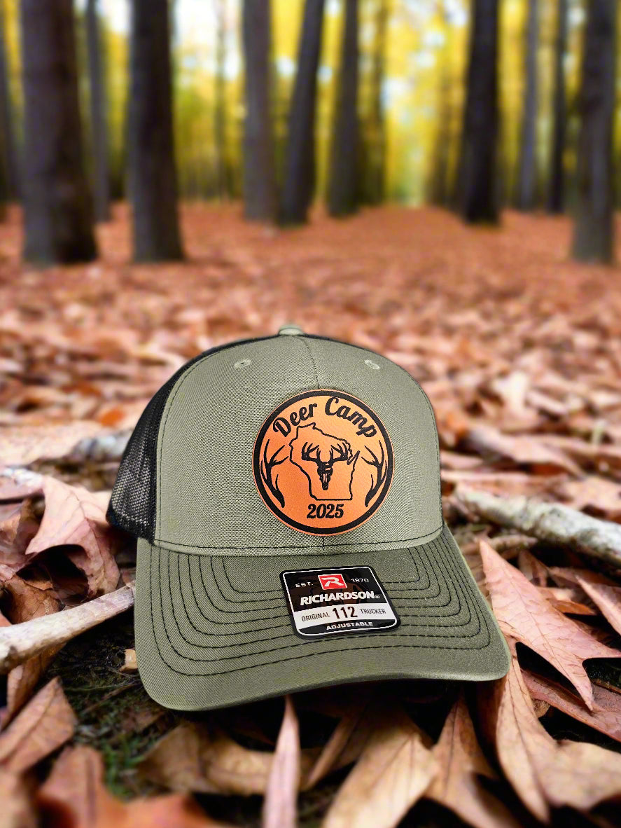 Green cap with a logo and text on a textured surface