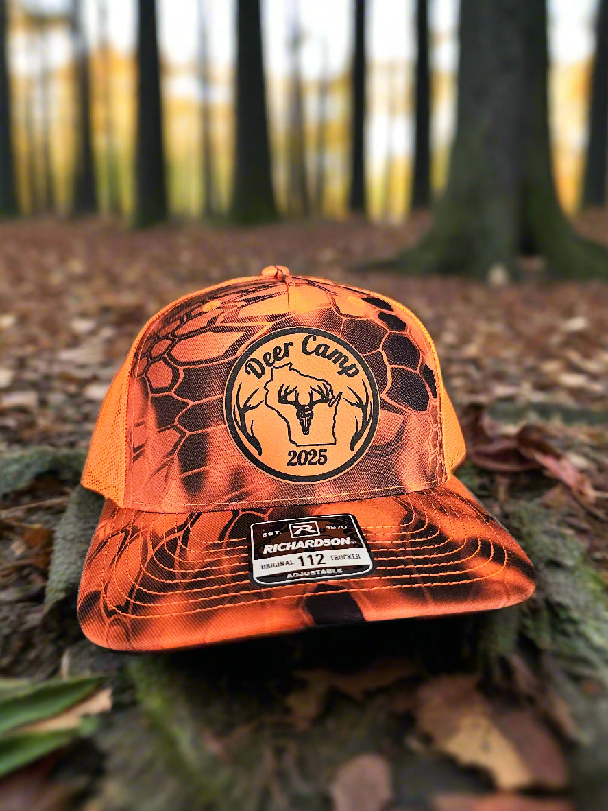 Orange transparent cap with branding on a textured surface